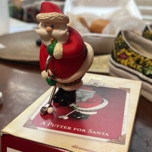 Reserved Hallmark keepsake ornament "a putter for santa"